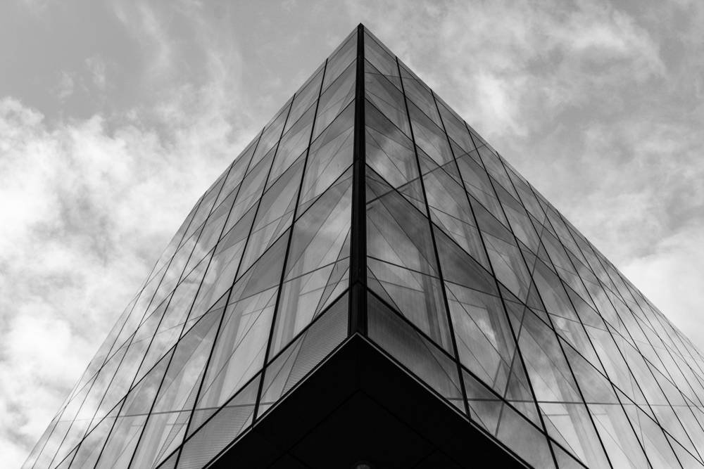Glass office building in black and white