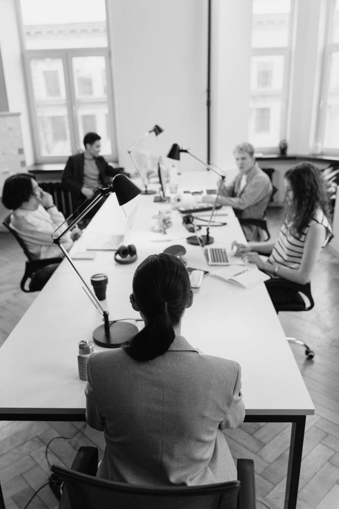 Consultants working together around a table